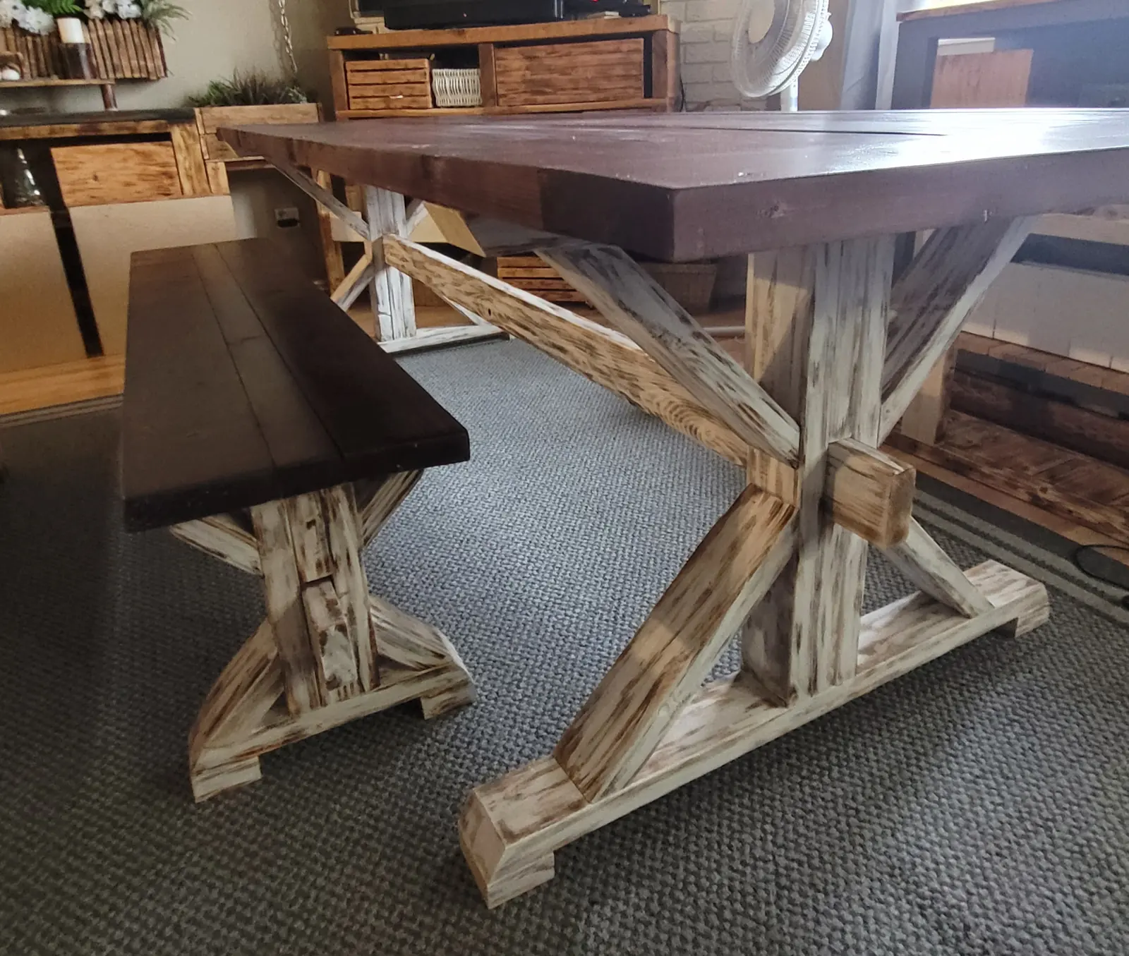 Rustic farmhouse table and bench with X trestle base and dark stained top