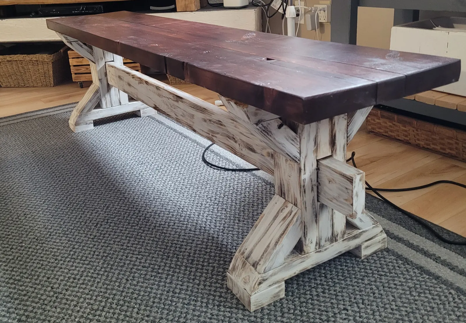 Handmade trestle bench with torched, white-washed base and dark stained top
