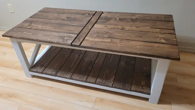 Handmade rustic coffee table with dark stained plank top and white X-frame base
