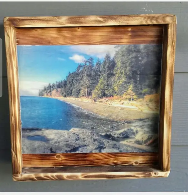 Shoreline photograph set in a torched rustic wood frame