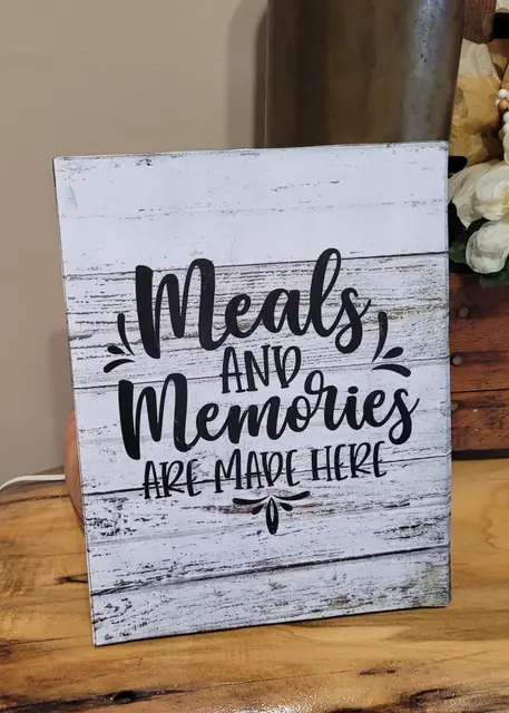 Kitchen decoupage sign reading Meals and Memories Are Made Here