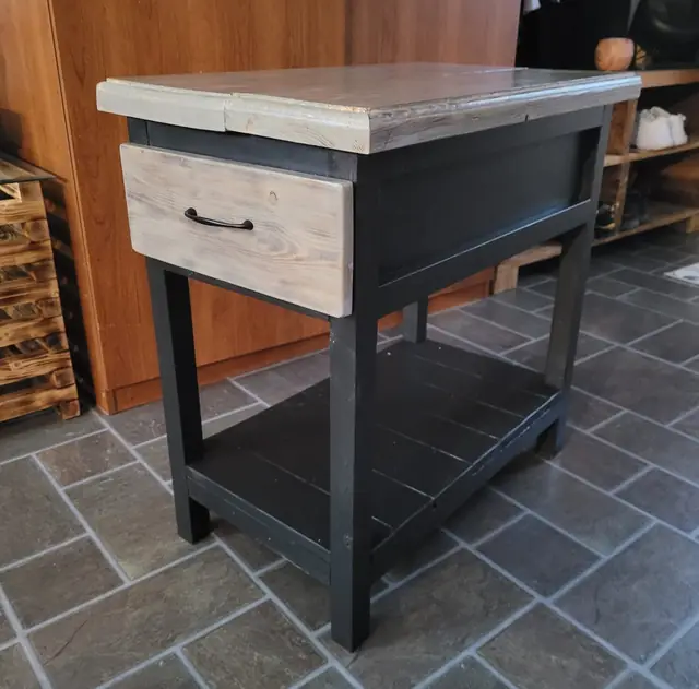 Slim kitchen island with drawer, black base and light plank top
