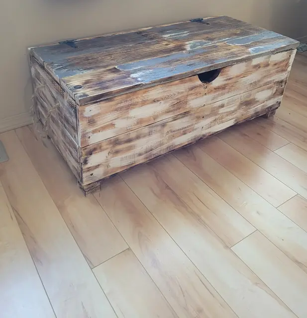Rustic wood storage trunk with weathered torched finish