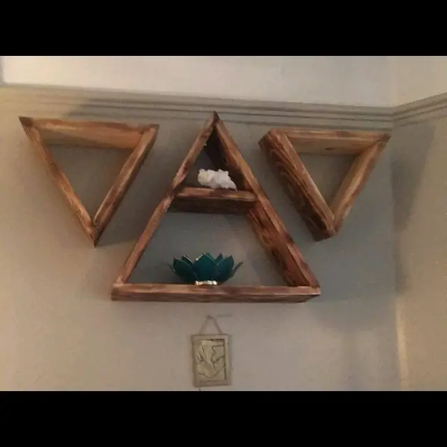 Set of three torched triangle wall shelves